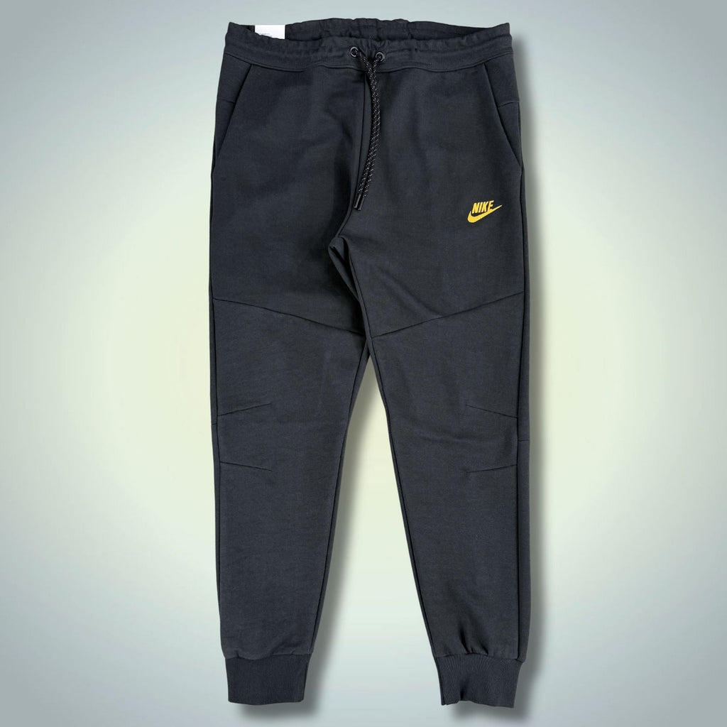 Nike Tech Fleece muške sportske hlače, grafitne, žuti logo. Premium kvaliteta
